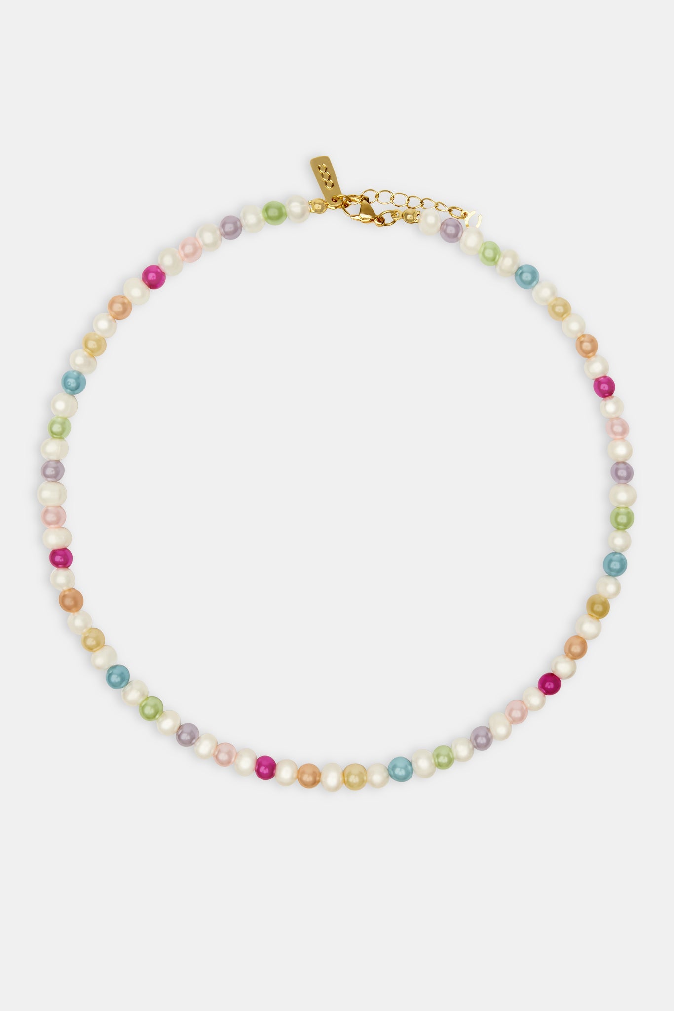 Multicolour pearl necklace on white background